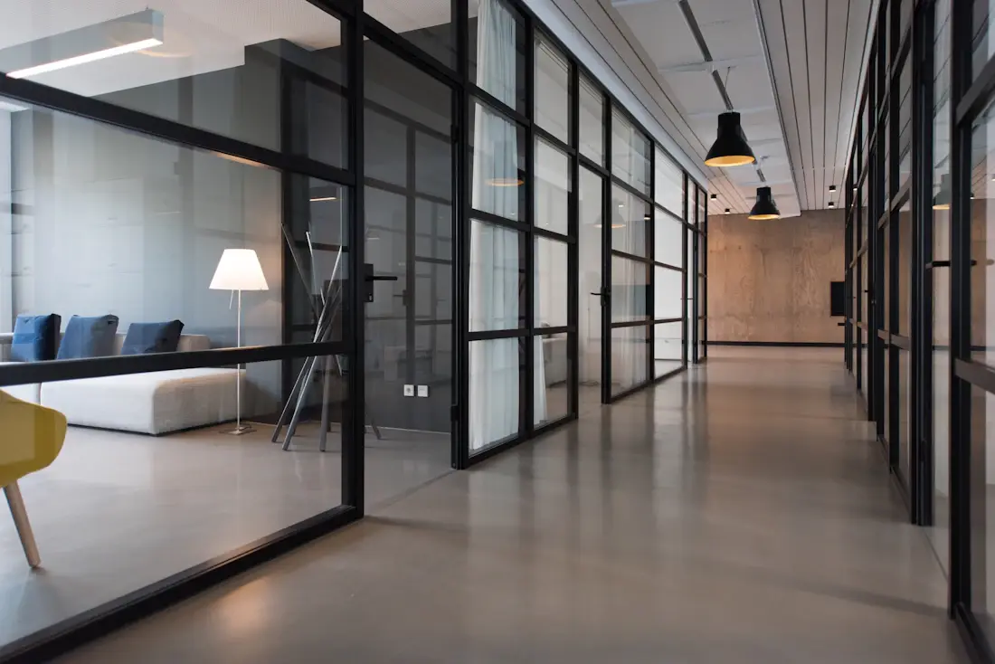 Modern shared office workspace representing a connected business group
