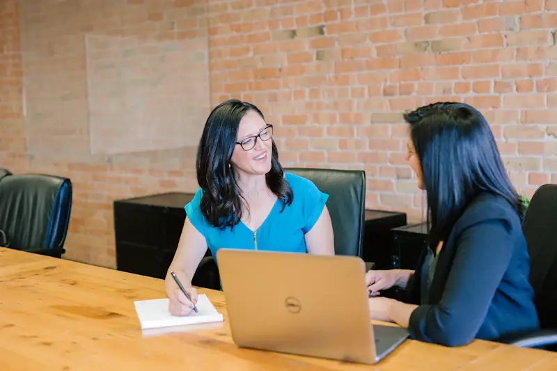 Colleagues planning work coverage