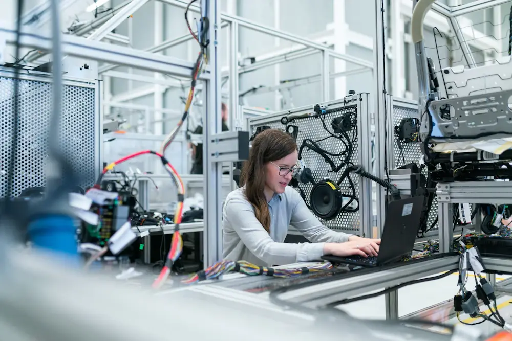 Manufacturing engineer reviewing production operations